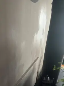 how to get candle wax off the wall