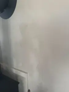 how to get candle wax off wall